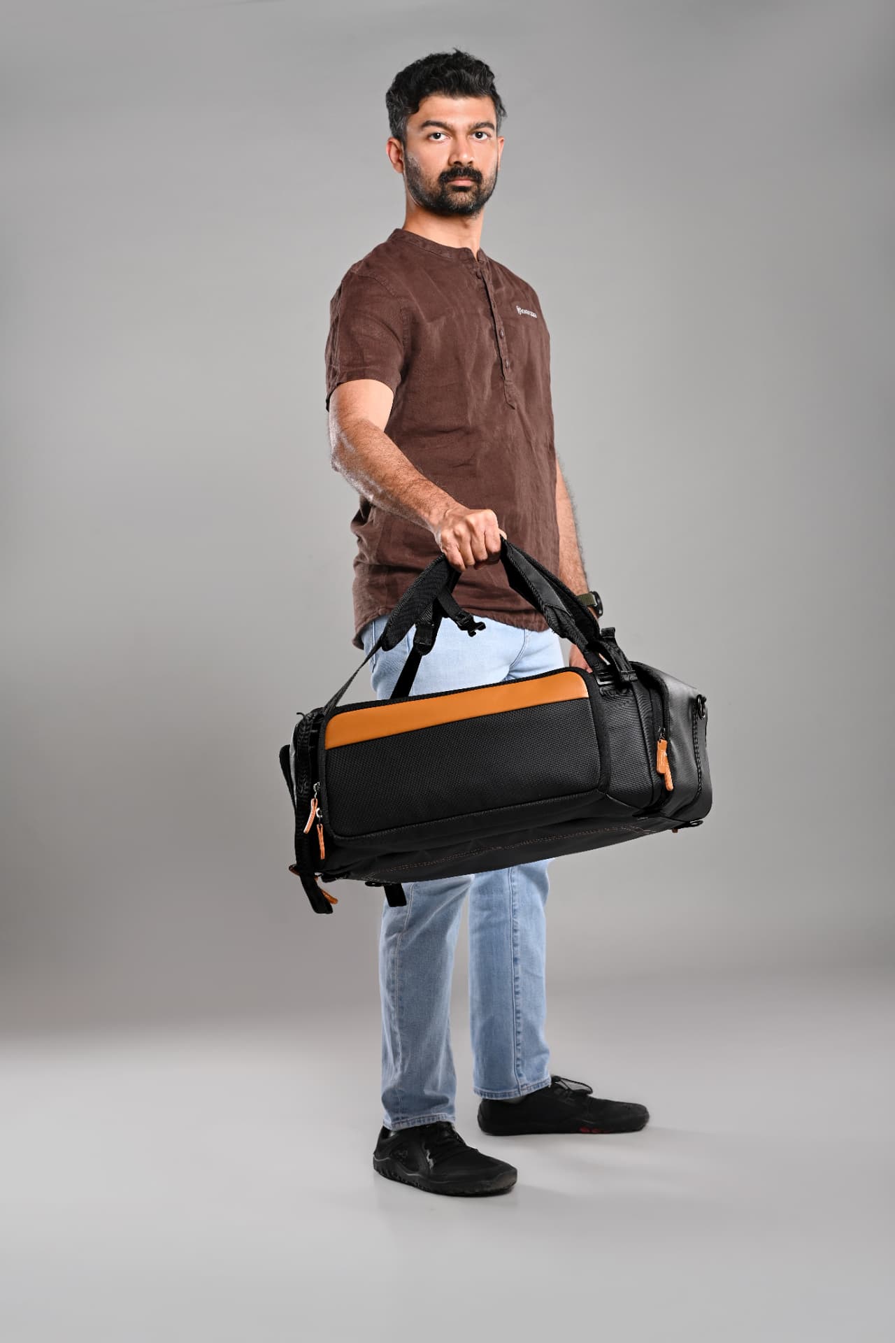 Stride 3-in-1 duffel carried as a travel bag